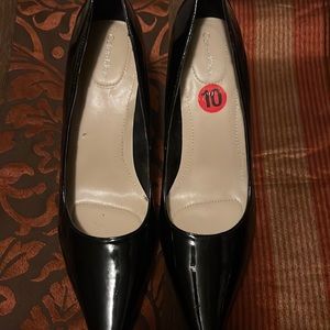 Black Calvin Klein pumps